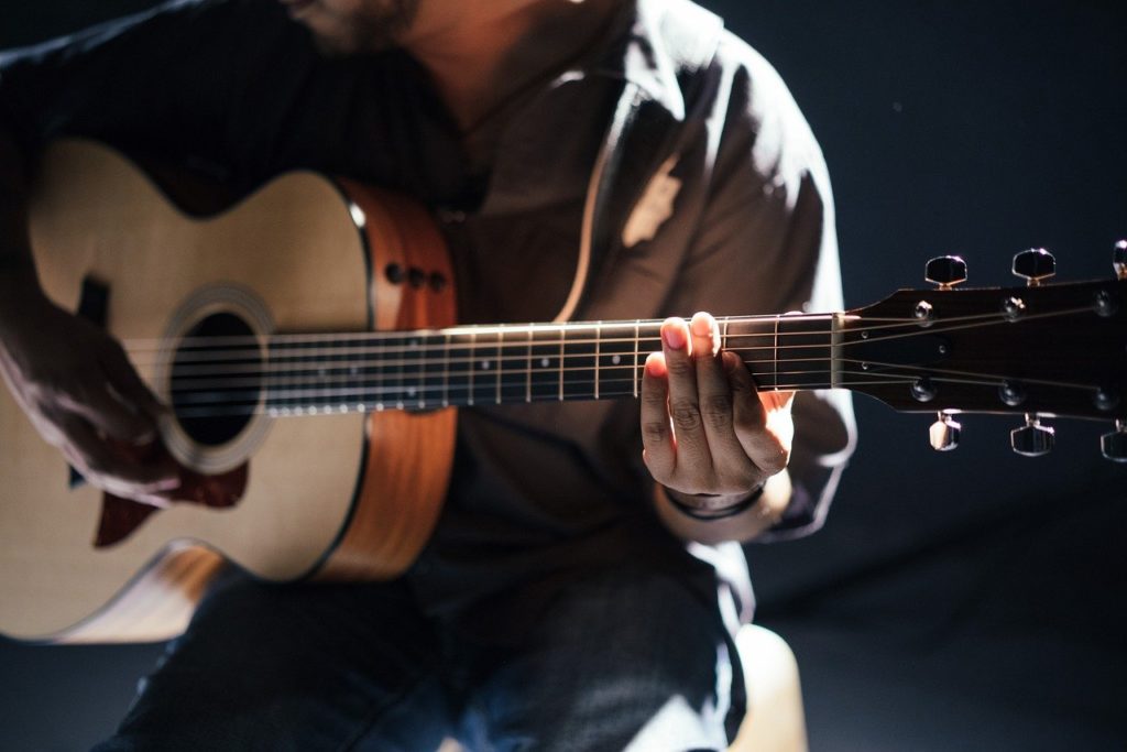 acoustic guitar and musician